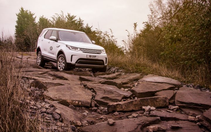 Land Rover on rocky ground.