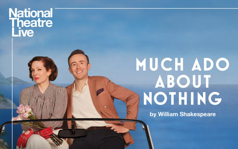 A man and a woman sit in a car in front of a sea view.